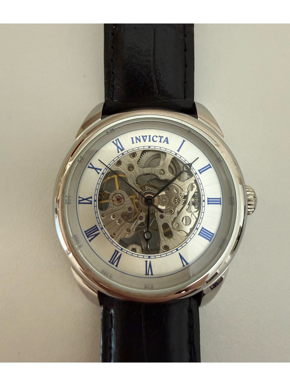 Invicta Men’s Silver Skeleton Dial Watch with Black Leather Strap